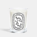 Shop Rescue Spa Feuille De Lavende scented candle in a clear glass vessel with a signature oval label