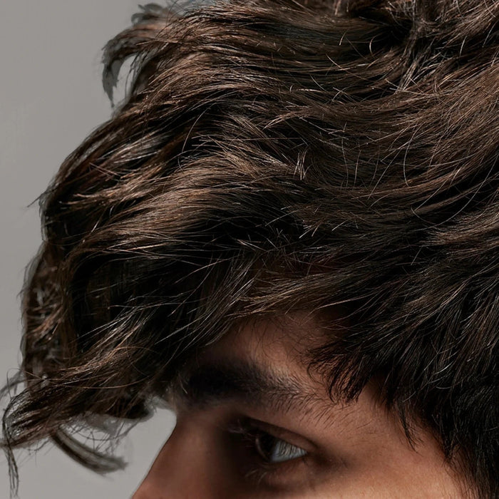 Shop Rescue Spa Flash Form Finishing Spray Wax for textured, shiny, dark brown hair. Vegan formula.