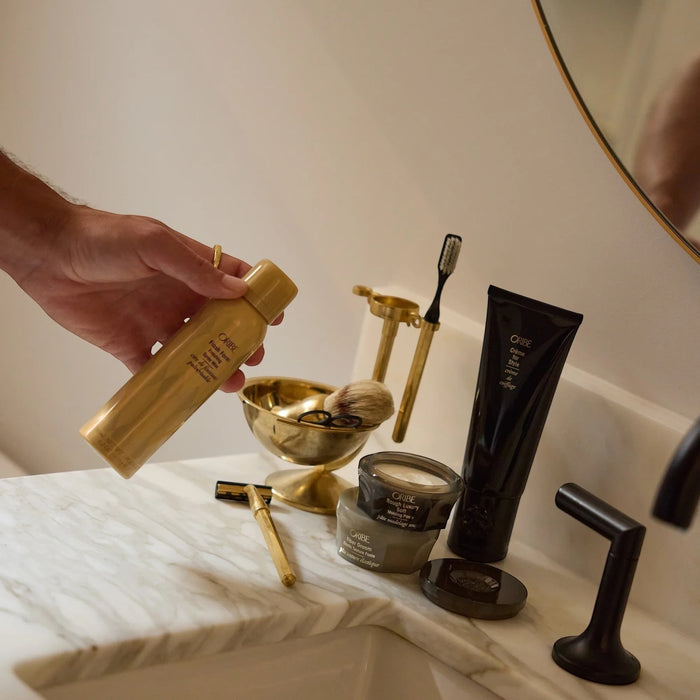 Shop Rescue Spa Oribe Flash Form Finishing Spray Wax for buildable texture and shine. Gold can.