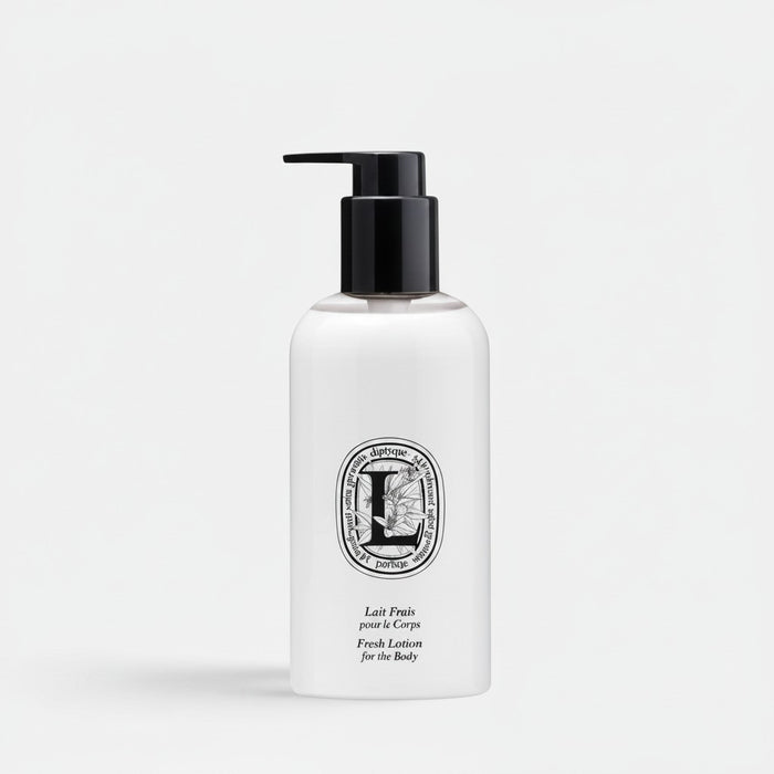 Shop Rescue Spa fresh body lotion in a 250ml white bottle with a black pump dispenser and orange blossom label