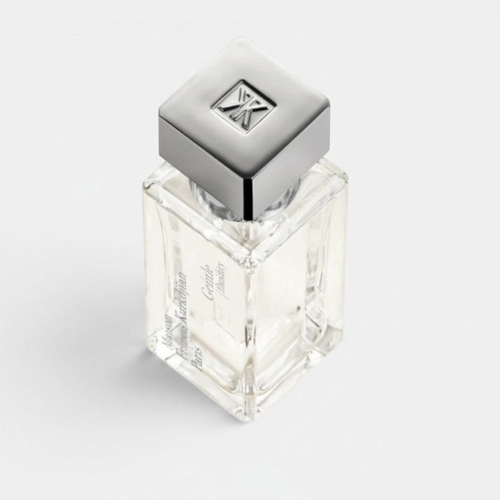 Shop Rescue Spa Maison Francis Kurkdjian Gentle Fluidity Silver Eau De Parfum bottle with silver cap.