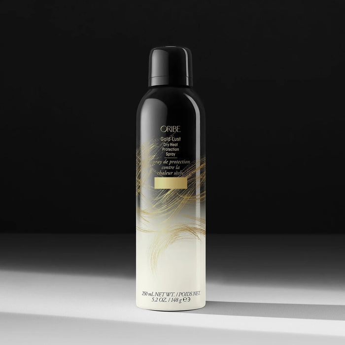 Shop Rescue Spa Oribe Gold Lust Dry Heat Protection Spray, a black aerosol can with gold accents, 250ml.