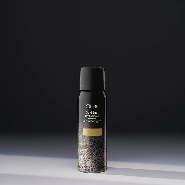 Shop Rescue Spa Oribe Gold Lust Dry Shampoo in a black and gold aerosol bottle for hair cleansing and oil absorption.