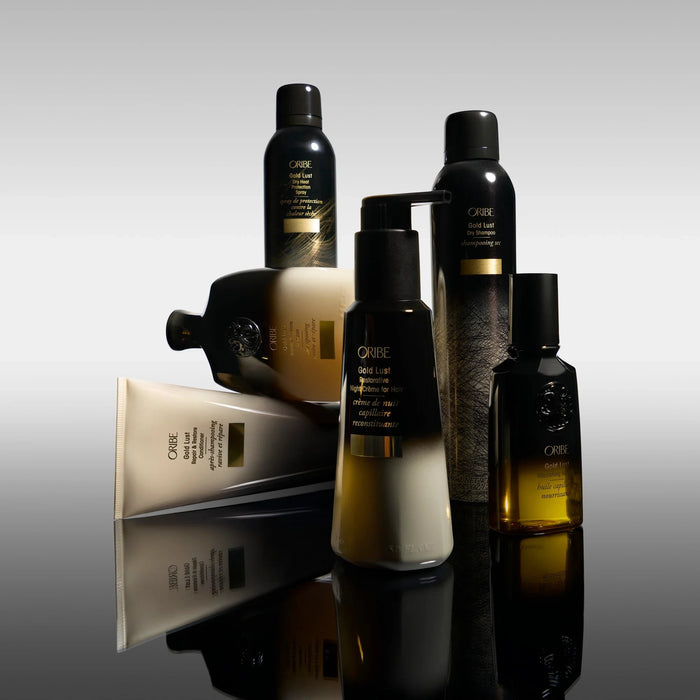 Shop Rescue Spa Oribe Gold Lust hair care collection featuring restorative night creme, shampoo, and oil bottles.