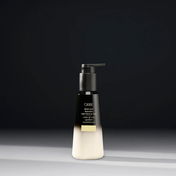 Shop Rescue Spa Oribe Gold Lust Restorative Night Creme for hair in a black and white ombre pump bottle.