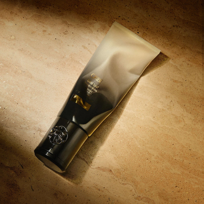 Shop Rescue Spa Oribe Gold Lust Transformative Mask in a black and gold gradient squeeze tube for hair restoration.