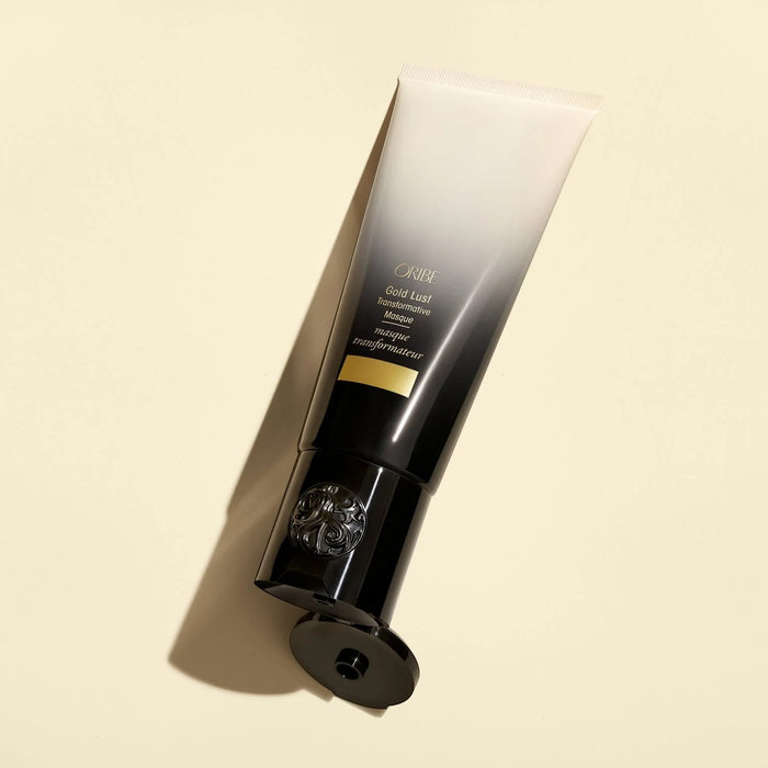 Shop Rescue Spa Oribe Gold Lust Transformative Mask in a black and cream gradient tube for hair repair and shine.