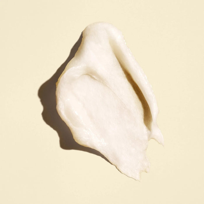 Shop Rescue Spa Gold Lust Transformative Mask creamy white hair treatment texture swatch on a light beige background