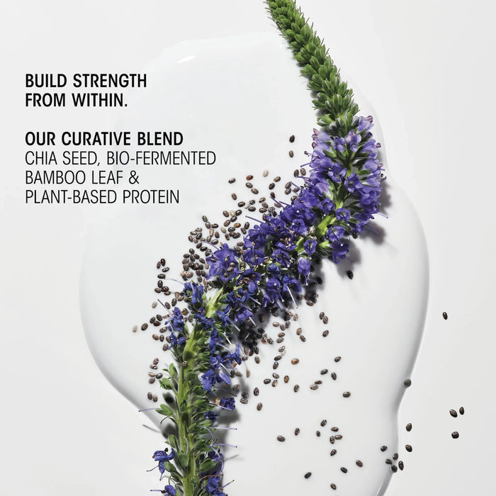 Shop Rescue Spa Hair Alchemy Heatless Styling Balm texture with purple flowers, chia seeds, and white cream base.
