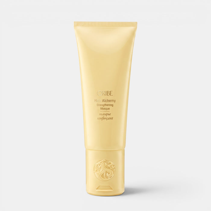 Shop Rescue Spa Oribe Hair Alchemy Strengthening Masque in a pale yellow squeeze tube for brittle hair.
