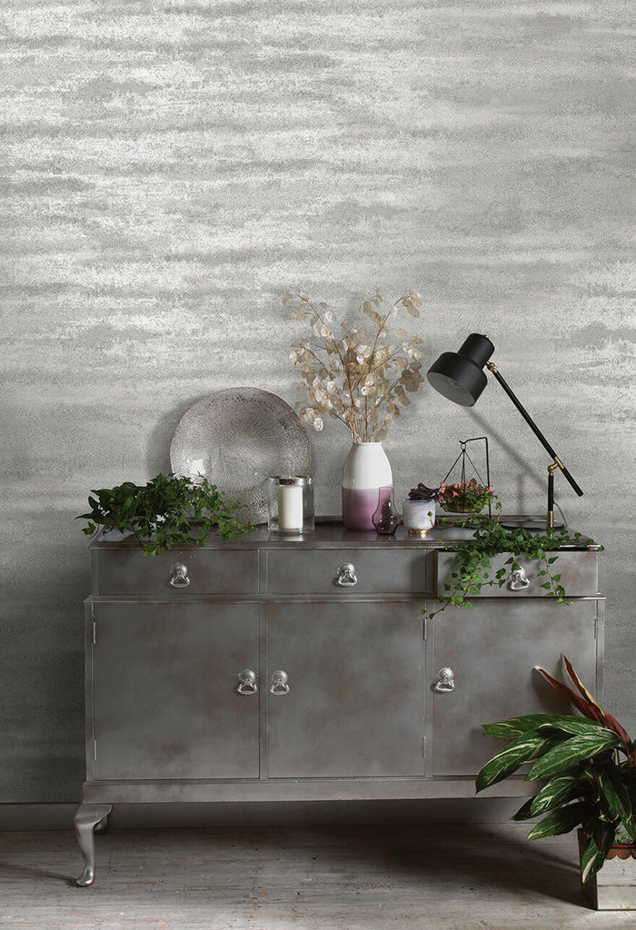 Horizon Glass Bead wallpaper in dove grey styled on a feature wall