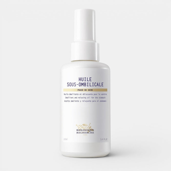 White bottle of Huile Sous-Ombilicale on a white background. Spray bottle of toning oil designed to reduce stomach bloating and puffiness, enriched with essential oils like cedarwood and juniper, placed on a clean background.