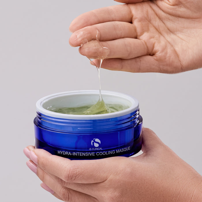 Shop Rescue Spa iS Clinical Hydra-Intensive Cooling Masque gel texture being applied from a blue jar