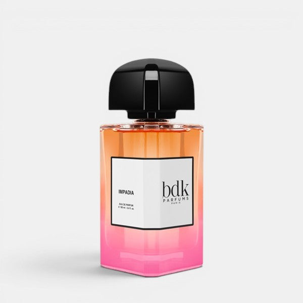BDK Parfums Impadia perfume bottle centered front view white background orange to pink gradient fragrance juice black cap luxury niche fragrance
