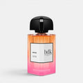 BDK Parfums Impadia perfume bottle centered front view white background orange to pink gradient fragrance juice black cap luxury niche fragrance