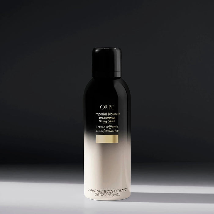 Shop Rescue Spa Oribe Imperial Blowout Transformative Styling Creme in a black and white bottle for hair volume.