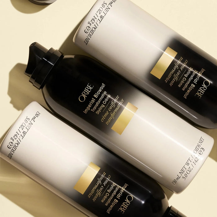 Shop Rescue Spa Oribe Imperial Blowout Transformative Styling Creme bottles in a flat lay arrangement