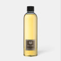 Shop Rescue Spa Dr. Vranjes Leather Oud room diffuser refill bottle with golden fragrance liquid and black cap.