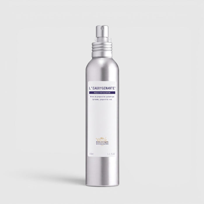 Shop Rescue Spa L'Eauxygenante revitalizing facial mist in a silver spray bottle for hydration and radiance.