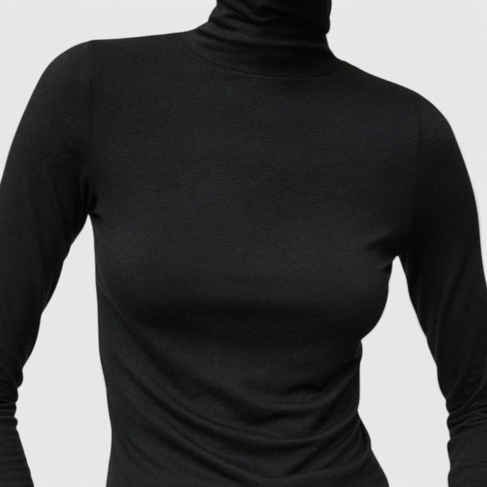 Shop Rescue Spa lightweight black jersey turtleneck made from a soft Tencel and cashmere blend.