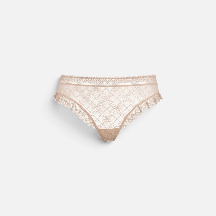 Beige lace thong underwear with a delicate pattern and scalloped edges, shown against a plain light gray background.