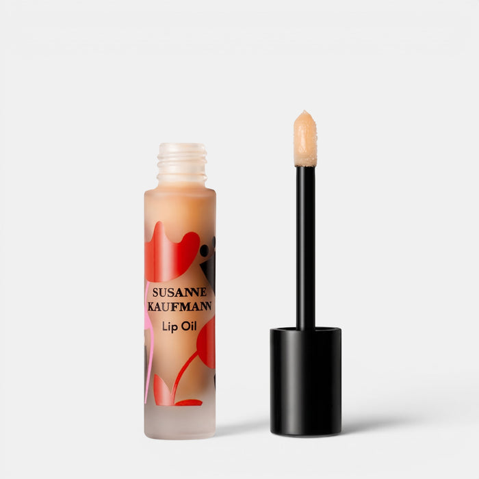 Shop Rescue Spa Susanne Kaufmann lip oil in a frosted glass bottle with a floral design and applicator wand