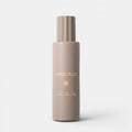 Shop Rescue Spa Amouage Love Delight hair perfume in a matte taupe bottle with a ribbed cap on a white background