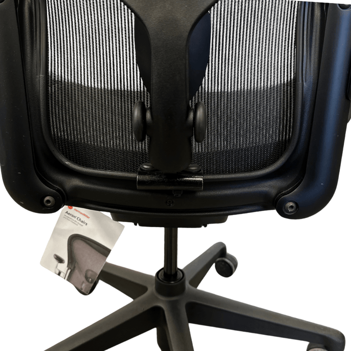Herman Miller Aeron chair with PostureFit SL kit and OLS adapter, black mesh backrest
