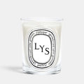 Shop Rescue Spa Lys scented candle in a clear glass vessel with a white wax floral fragrance