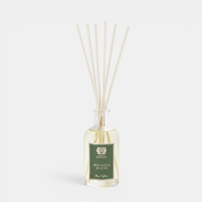 Diffuser with reeds and a label on a white background