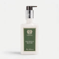 Shop Rescue Spa Magnolia Bloom hand and body moisturizer in a clear pump bottle with a green label