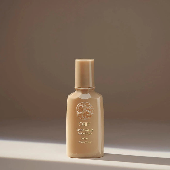 Shop Rescue Spa Oribe Matte Waves Texture Lotion for beachy waves and matte finish. Light lotion formula.