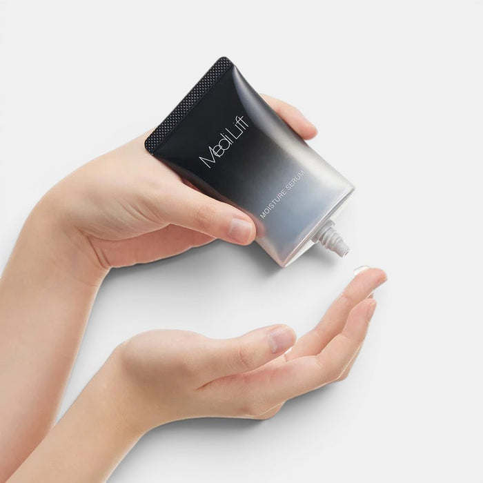 Medi Lift Moisture Serum bottle held in hand, serum being dispensed into another hand.