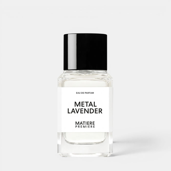Shop Rescue Spa Metal Lavender eau de parfum in a clear glass bottle with a black cap against a white background.