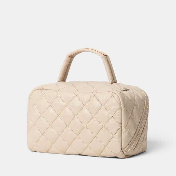 Shop Rescue Spa Metro Accordion II beige quilted cosmetic bag with top handle and zip closure
