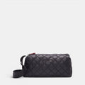 Shop Rescue Spa MZ Wallace black quilted nylon Metro Boxy Crossbody bag with leather trim and adjustable strap.