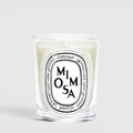 Shop Rescue Spa Diptyque Mimosa scented candle in a clear glass vessel with a signature oval label