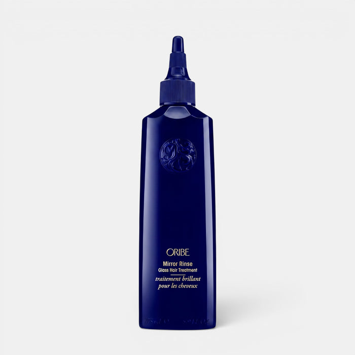 Shop Rescue Spa Oribe Mirror Rinse Glass Hair Treatment in a dark blue 175ml bottle for ultra-glossy hair shine.