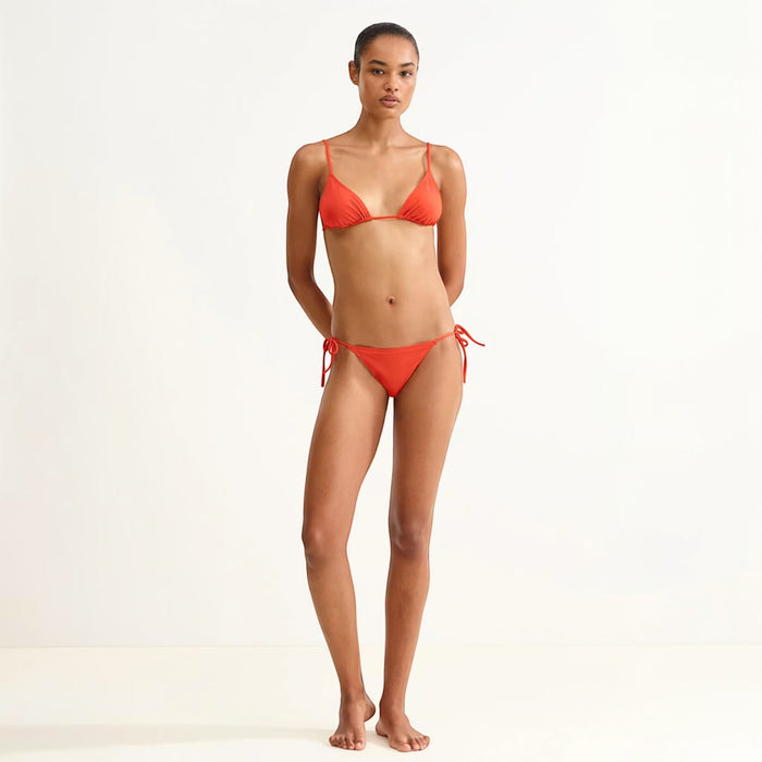Shop Rescue Spa Mouna Rooibos sliding small triangle bikini top with spaghetti straps in orange.