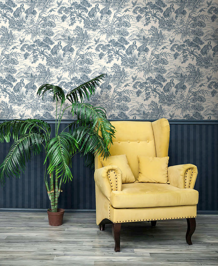 Natoru Japanese Metallic Cranes wallpaper in navy/cream on a feature wall