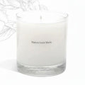 Shop Rescue Spa No. 12 - Bousval candle in a clear glass jar with a soy blend wax and cotton wick. Scent notes of orange, bergamot, cardamom, ginger, eucalyptus, oakmoss, woods, and musk.