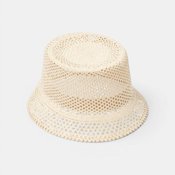 Angled view of Eres Palmyre Sun Hat on a white background, showing brim shape and overall structure.