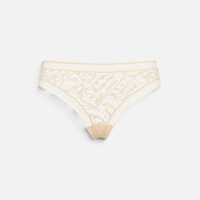 Shop Rescue Spa Pistil beige stretch Leavers lace tanga with delicate lace trim at the waist and leg openings.