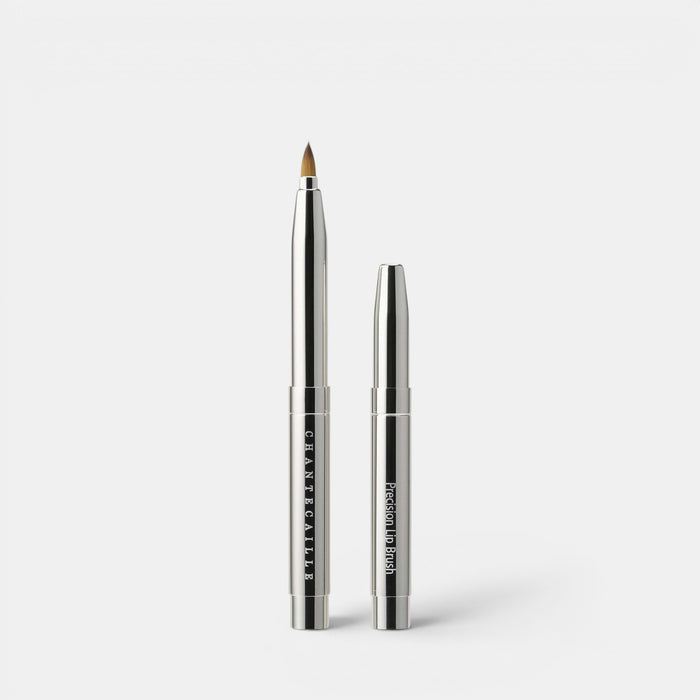 Chantecaille Precision Lip Brush positioned upright with a white background. A retractable, self-sealing soft vegan brush.
