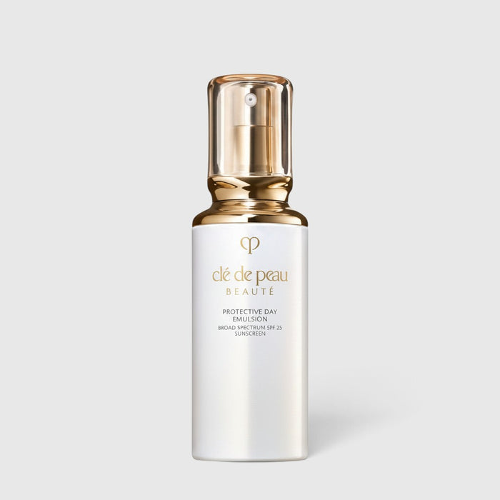 Shop Rescue Spa Cle de Peau Beaute Protective Day Emulsion SPF 25 in a white pump bottle with a gold cap.