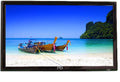 A 42-inch PDI E-Series HDTV hospital display showing a vibrant image of a beach scene with boats.