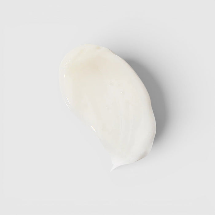 Shop Rescue Spa Restorative Eye Complex cream texture swatch showing a smooth white anti-aging formula