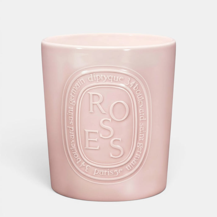 Shop Rescue Spa Roses scented candle in a pale pink ceramic vessel with embossed floral branding
