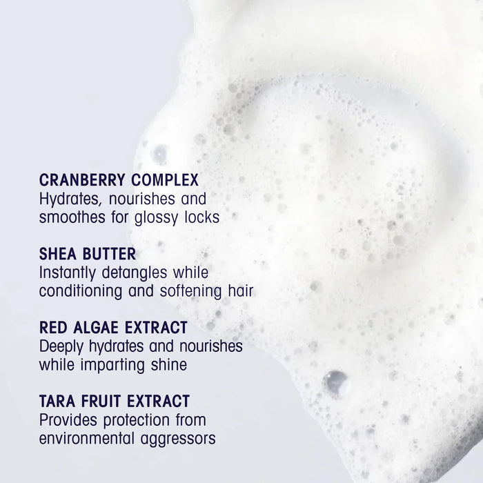 Shop Rescue Spa Run-Through Detangling Shampoo with cranberry complex, shea butter, red algae extract, and tara fruit extract.