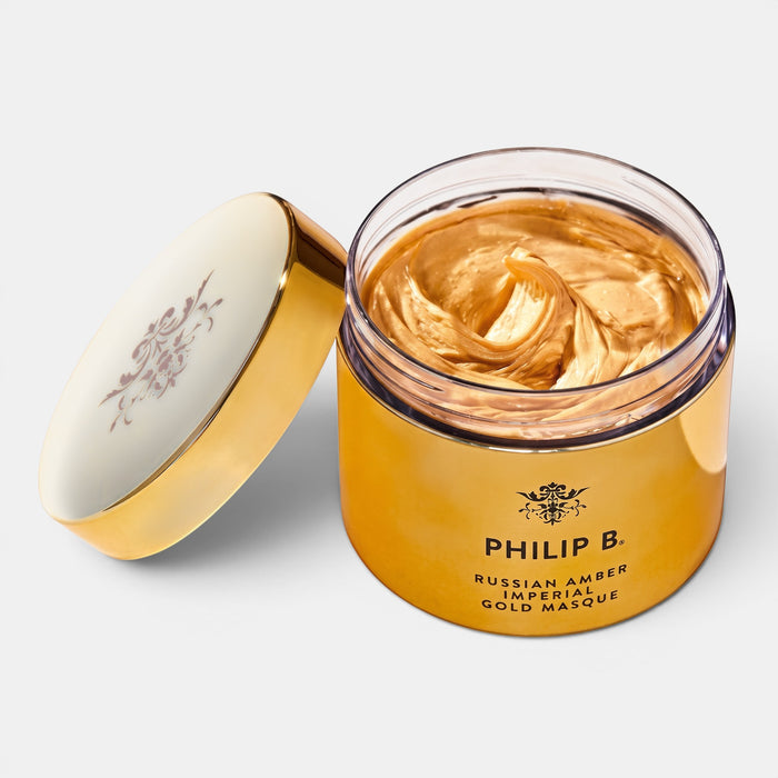 Shop Rescue Spa Philip B. Russian Amber Imperial Gold Masque in a gold jar with a rich, shimmering gold cream texture.